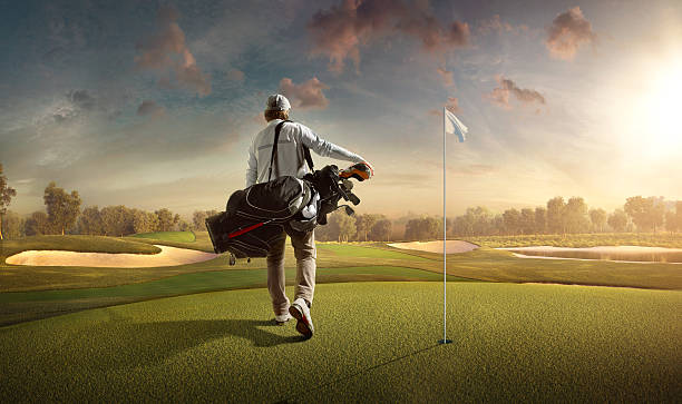 Man playing Golf on beautiful Golf course. The course is made in 3D.